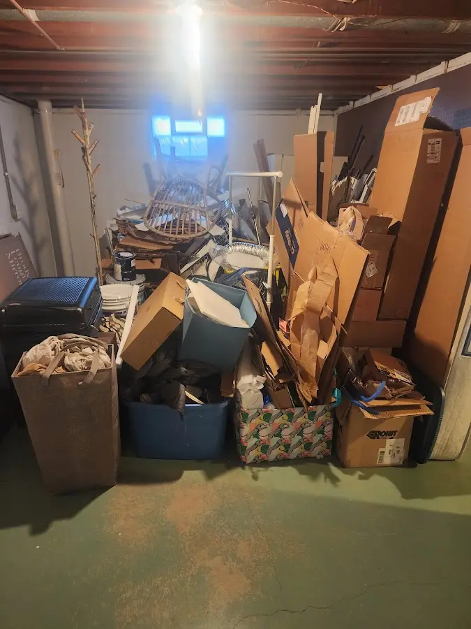 Roll-off dumpster container at job site for 8 Yard Dumpster Rental in Eastpointe